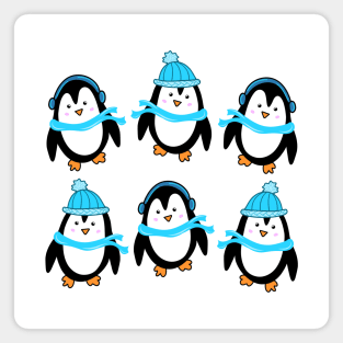 Festive Winter Penguins with Blue Scarves and Hats, made by EndlessEmporium Magnet